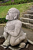 Candi Cetho - Kneeling guardian at the sixth terrace. 